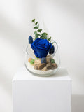 Arrangement de rose éternelle bleue
